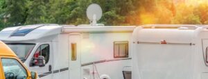 SR Mecatronic satellite TV system mounted on the roof of a motorhome.